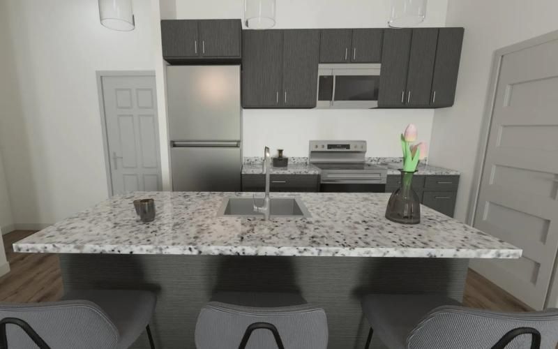 a kitchen island with a table and chairs