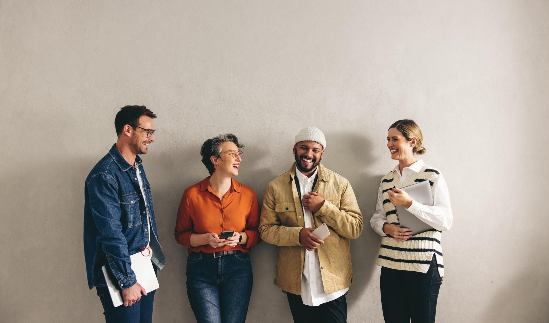 Settle into comfort at 46 Flats a group of people standing together