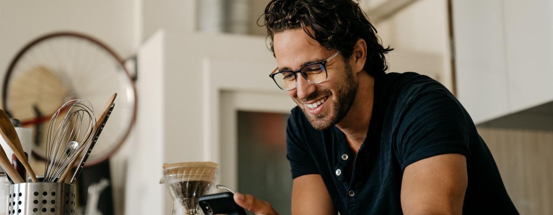 a man holding a phone