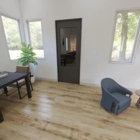 Beautiful living areas to match your lifestyle a living room with a table chairs and a plant and windows